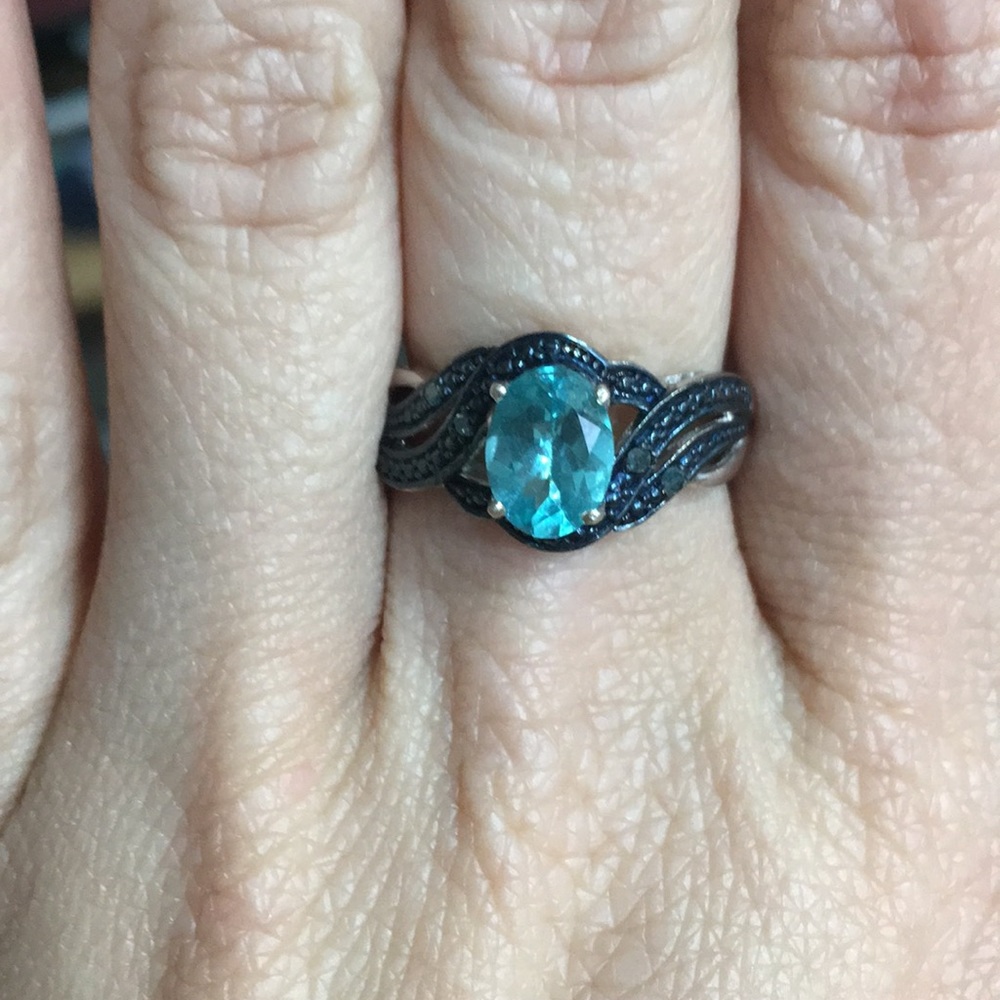 Blue topaz and blue diamond ring